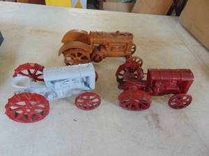 lot 3221 image: Cast iron toy tractors