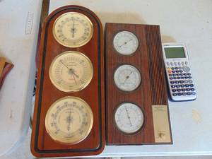 lot 3235 image: Barometers and calculator