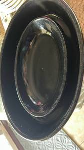 lot 6999 image: Black Glazed Oval Ceramic Serving Dish with Raised Interior Well