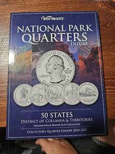 lot 71069 image: Warmans National Park Quarters Deluxe Collectors Quarter Folder 2010-2021
