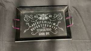 lot 7781 image: Ouija Board with Planchette and Pink Handles
