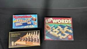 lot 7818 image: Lot of 3 Board Games Wooden Chess Set, Upwords, Rummikub, and Rummikub Fast Moving
