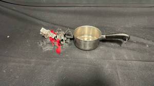 lot 7846 image: Metal Saucepan with Black Handle and Cookie Cutters Set