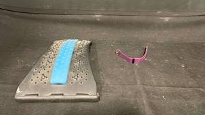 lot 7858 image: Surfboard Fin Set with Blue Center Fin and Purple Strap