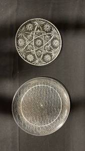 lot 7864 image: Two Clear Glass Plates with Geometric and Floral Pressed Patterns