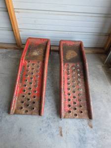 lot 13 image: Pair of Red Perforated Metal Ramps