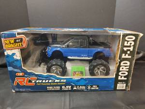 lot 204 image: NIB Bright RC Trucks Ford F-150 Radio Control, untested