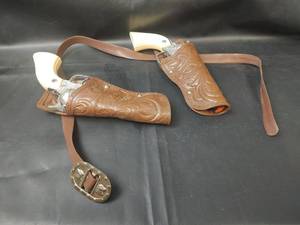lot 320 image: Vintage Toy Cap Gun Revolvers with Holsters