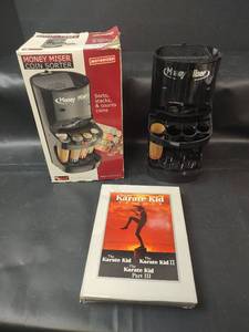 lot 327 image: Money Miser Motorized Coin Sorter with Karate Kid DVD Trilogy
