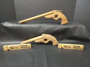lot 328 image: Wooden Train Whistles and Toy Gun Pistols
