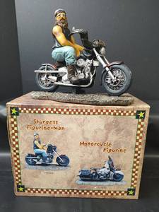 lot 374 image: Sturgess Figurine-Man Motorcycle Figurine