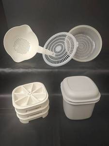 lot 555 image: Tupperware Stackable Ice Cube Trays, Strainers and Container