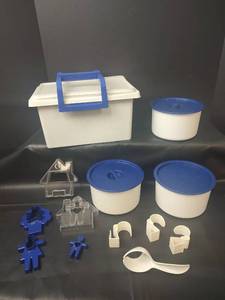 lot 558 image: Tupperware Storage Containers with Cookie Cutters