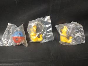 lot 617 image: Vintage Tupperware Key Chains