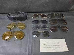 lot 663 image: 2 Pair Vintage Aviator Sunglasses and Universal Clip-On Sunglasses