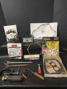 lot 764 image: Buffalo Impact Driver, Motorcycle Battery Charger, Wrench, Ratchet, Soldering Iron and Assecories