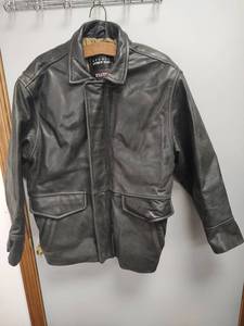lot 810 image: Studio Andrew Marc Black Leather Jacket MM