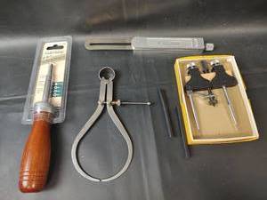 lot 849 image: NEW ITEMS Starrett Adjustable Trammel Points, Screwdriver, Calipers and Stanley Sliding T Bevel