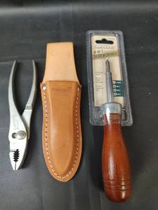 lot 850 image: NEW ITEMS 4-in-1 Screwdriver and Leather Sheath with Pliers