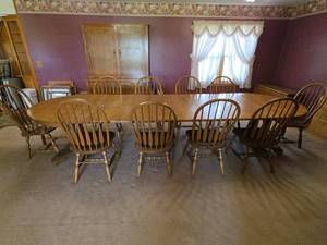 lot 5 image: Becker Solid Oak Oval Dining Table (on castors) with (10) Spindle Back Chairs and (7) 14.5in x 48in Leaves