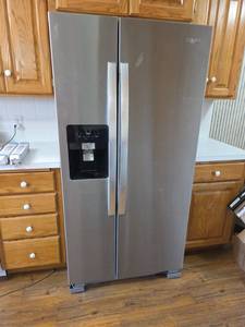 lot 8 image: Whirlpool WRS321SDHZ08 Stainless Steel Side-by-Side Refrigerator, 22 cu ft, Mfg. 122022, and Extra Water Filters