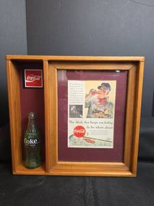 lot 216 image: Coca-Cola Collectible Display with 6.5 oz Bottle and Vintage Advertisement