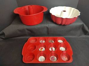 lot 318 image: Red Silicone Baking Molds and Metal Bundt Pan