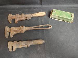 lot 439 image: Vintage Pipe Wrenches and Wood Sanding Block