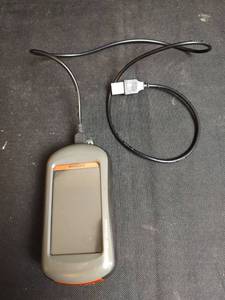 lot 529 image: Garmin GPS Device with USB Cable