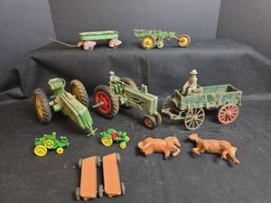 lot 539 image: Farm Toys - Cast Metal Tractors, Wagons, and Animals