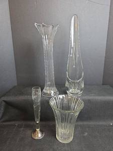 lot 553 image: Etched Bud Vase, Trumpet vase, Tall Etched Candle Stick, and Wide Flared Pleated Vase