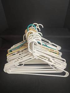 lot 570 image: 31 Plastic Clothes Hangers