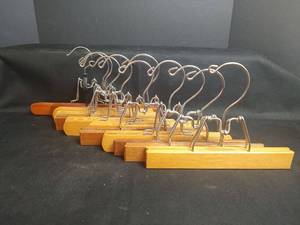 lot 572 image: 12 Wooden Pant Hangers