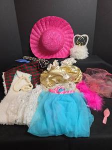 lot 633 image: Fantasy Playclothes Trunk, Doll Clothing, and Accessories (Pink Hat, Tulle Skirt, Necklace, Hair Brush)