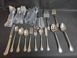 lot 635 image: Pfaltzgraff Flatware 12 Place Setting with Serving Utensils (78 Pieces)