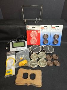 lot 652 image: RadioShack Caller ID, Super Sliders, Caster Cups, Page Boy, and Gun Locks