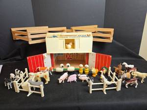 lot 673 image: Vintage Fisher-Price Family Farm Playset with Animals and Fences (Includes Large Wooden Fence, Barn Stamped 1967)