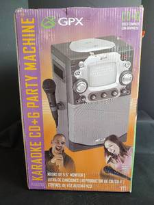 lot 694 image: GPX Karaoke CDG Party Machine with Built-In 5.5 Monitor CDCD-R Player with Accessories, Very Lightly Used
