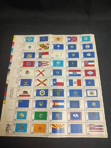 lot 718 image: Vintage U.S. Bicentennial Era 1776-1976 State Flags Stamp Sheet Collection