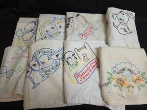 lot 745 image: Hand-Embroidered Tea Towels with Animal and Floral Designs (some staining)