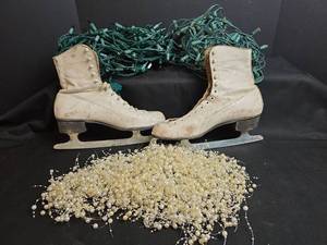 lot 749 image: Pair of White Lace-Up Ice Skates, 2 Multi-Color Light Strands, and White Beaded Garland