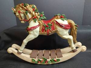 lot 769 image: Christmas Rocking Horse with Holly Berry and Red Ribbon