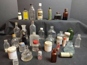 lot 820 image: Vintage Glass Bottles with Labels, Hair Oils, Pharmaceuticals, Lanolin and Ink Wells