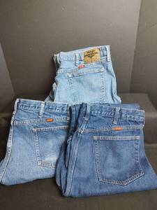 lot 913 image: Wrangler and Rustler Jeans, See Pictures for Sizes