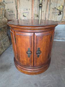 lot 1018 image: Round Wood Side Table with Two Doors