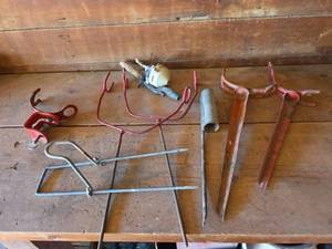 lot 1266 image: Fishing Pole Holders and Zebco Reel