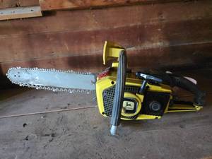lot 1275 image: John Deere TY050VA 50V Chainsaw (has compression)