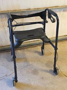 lot 1534 image: Invacare Rolling Walker with Seat and Brakes