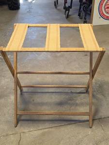 lot 1536 image: Luggage Rack with Yellow Straps and X-Frame