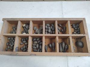lot 1575 image: Wooden Storage Box with Lead Fishing Weights and Sinkers Collection